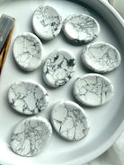 Howlite worry stones with natural white stone and distinctive gray marbled veining for calm and stress relief