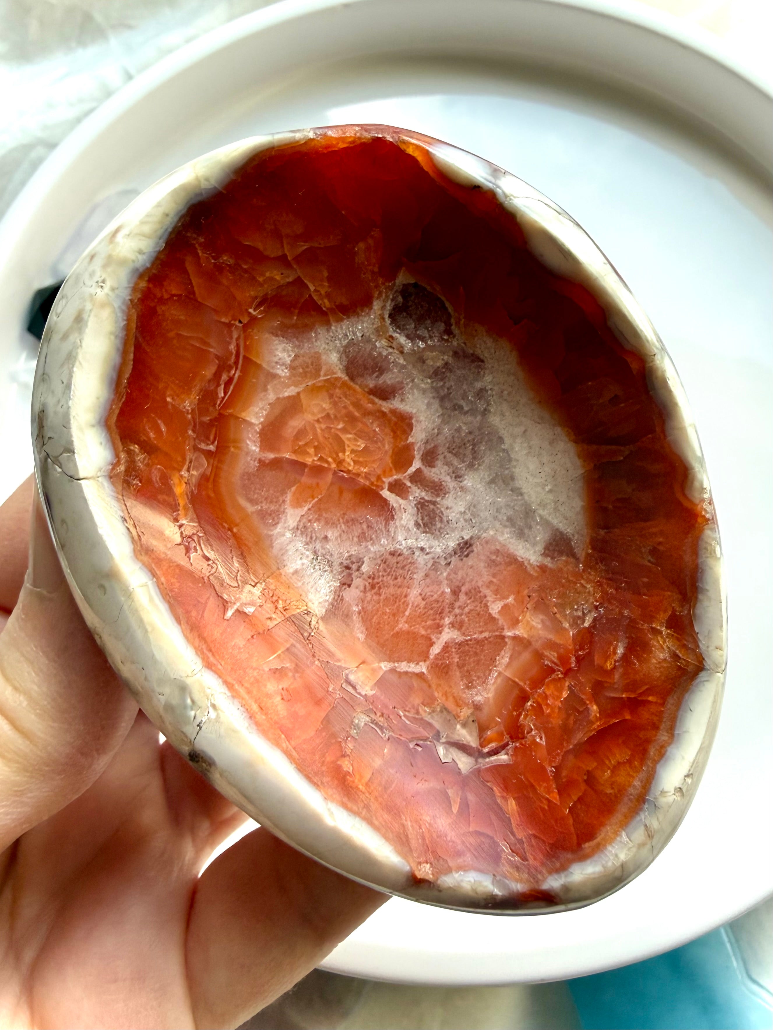 red carnelian crystal bowl with white quartz druzy core and banded agate edges