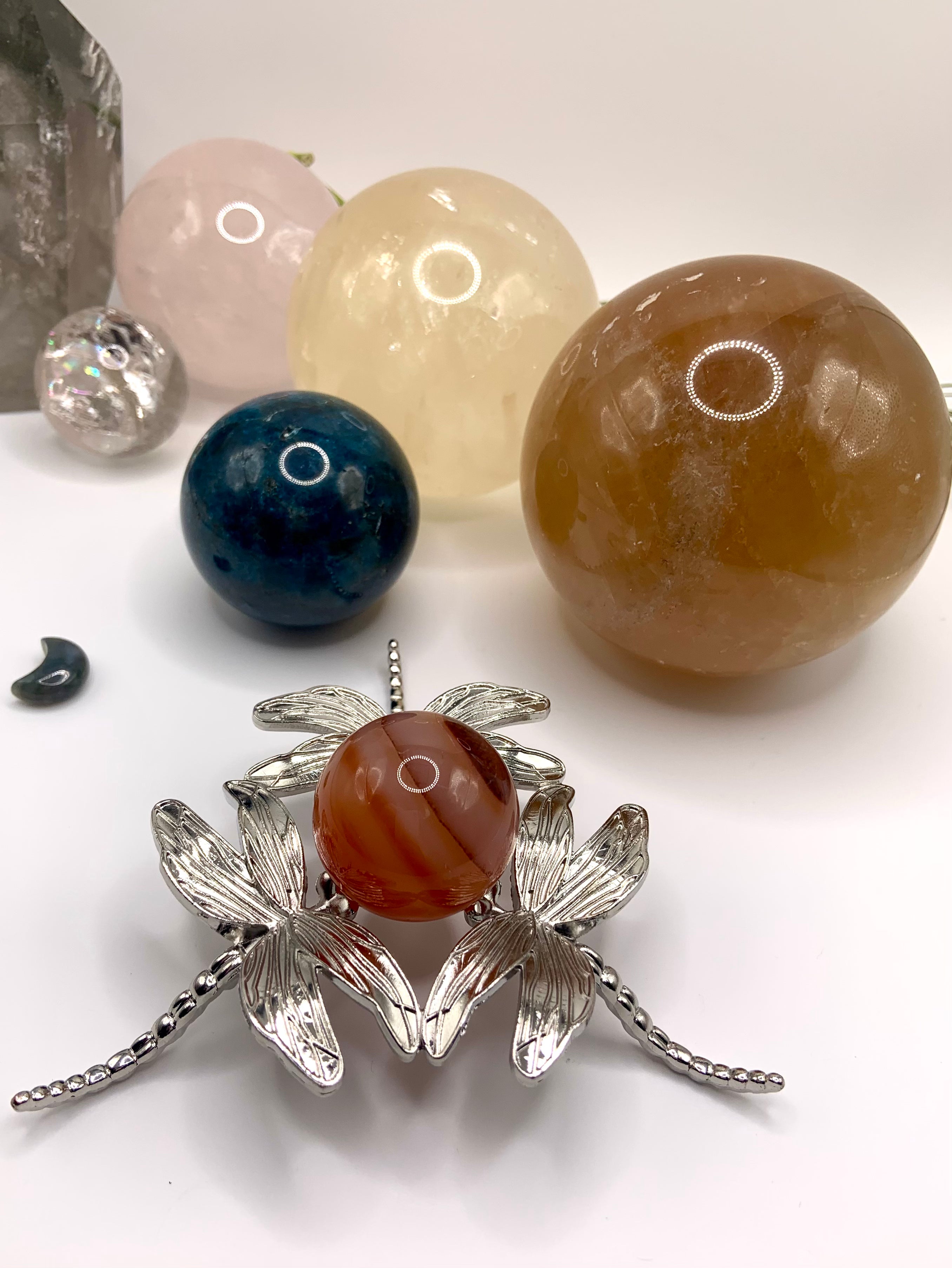 The larger sphere stand option shown with a 30mm carnelian sphere