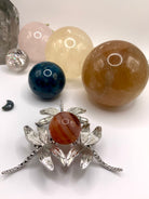 The larger sphere stand option shown with a 30mm carnelian sphere