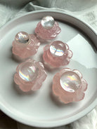 Rose Quartz lotus flower carvings holding mini girasol quartz crystal spheres, heart chakra altar decor