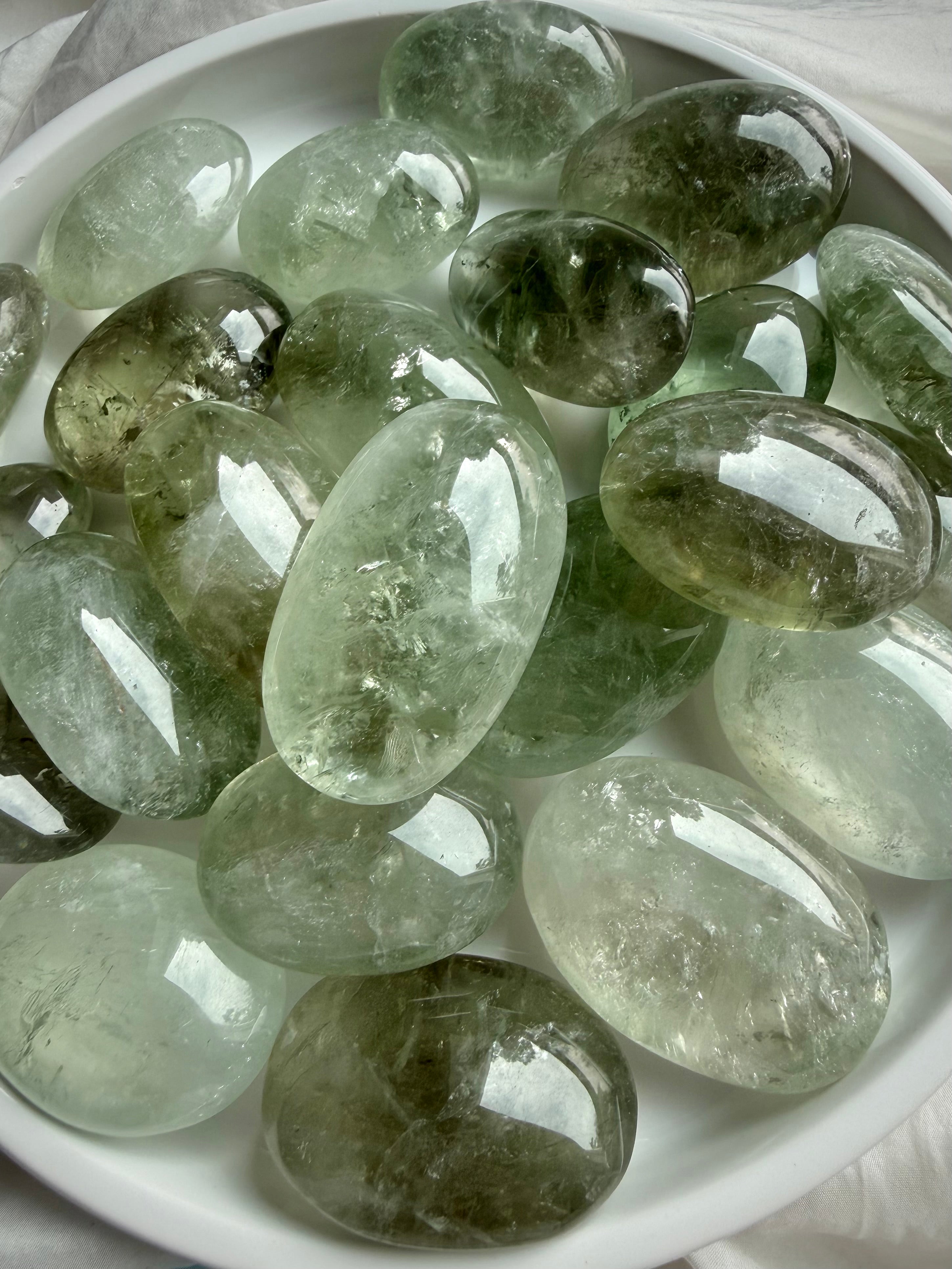 Prasiolite palm stones (Natural Green Amethyst) with luminous green translucency and natural crystal formations