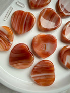 Carnelian heart worry stones polished orange crystal thumb stones for calm and grounding
