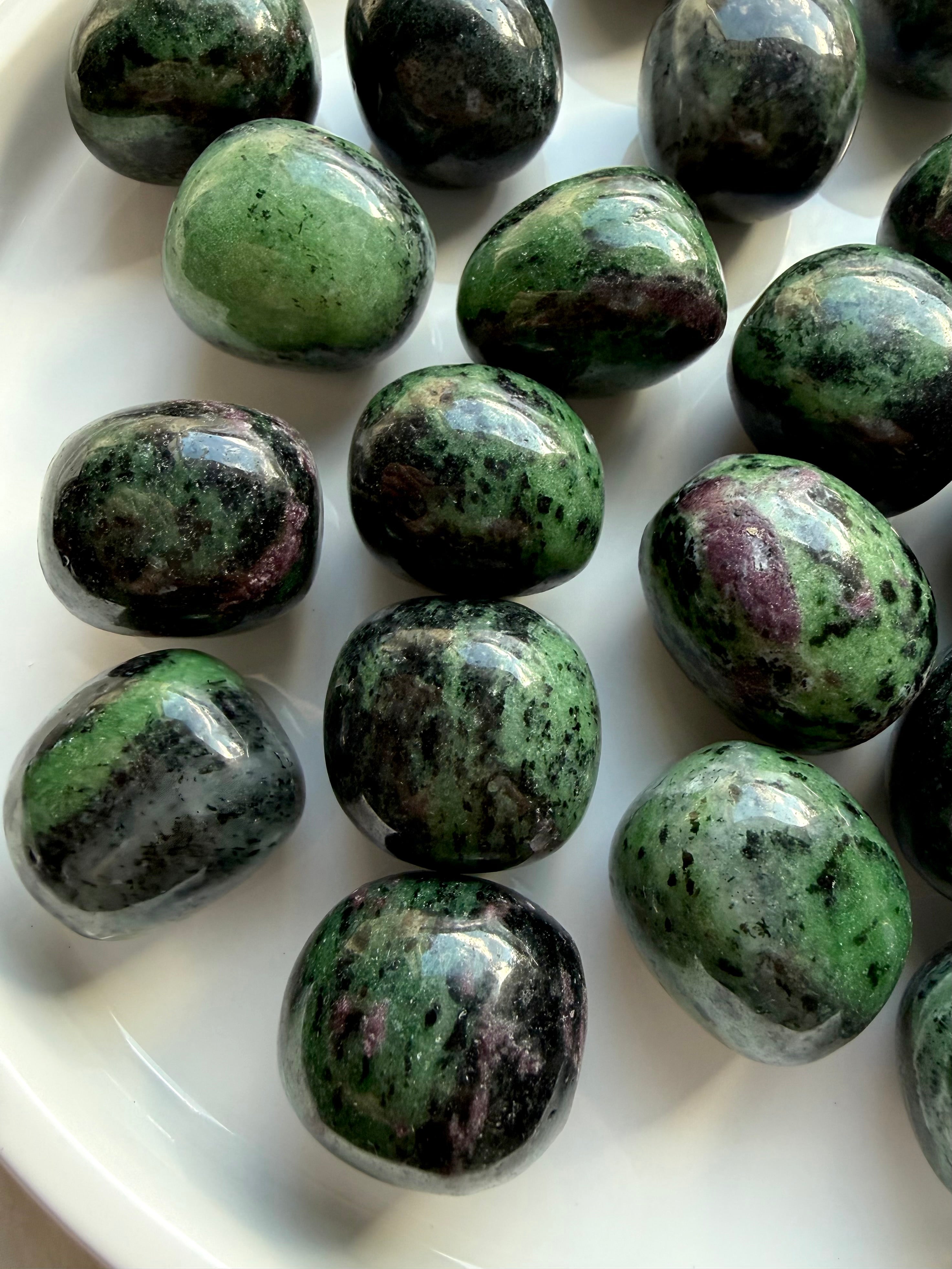 Polished Ruby Zoisite crystals with distinctive green, pink and black mineral patterns, natural Anyolite tumbled gemstones