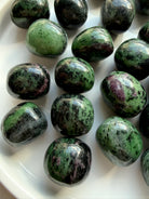 Polished Ruby Zoisite crystals with distinctive green, pink and black mineral patterns, natural Anyolite tumbled gemstones