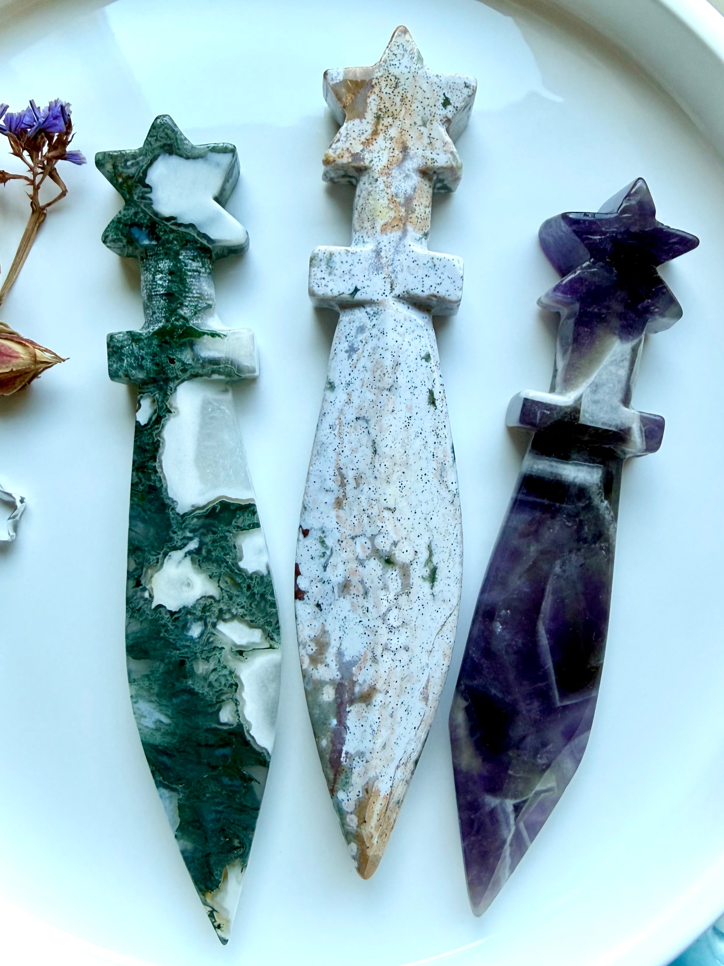Crystal star knife carvings in Moss Agate, Ocean Jasper, and Dream Amethyst for rituals and altar decor