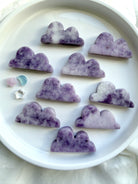Lepidolite cloud crystal carvings in soft lilac tones with natural patterning and calming energy