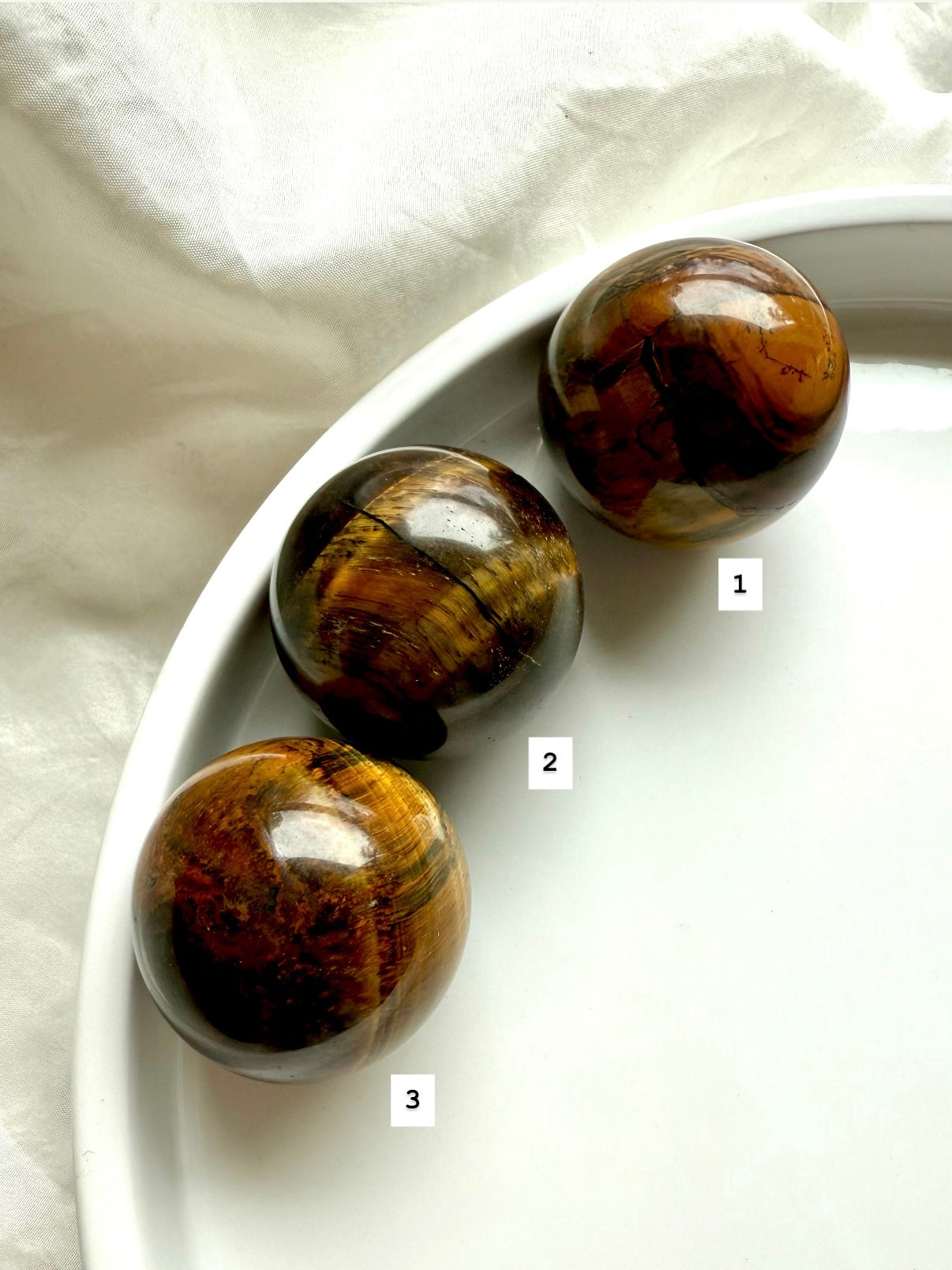 Tiger’s Eye spheres showing options 1, 2, and 3 with golden bands and chatoyancy — crystals for grounding &amp; clarity 