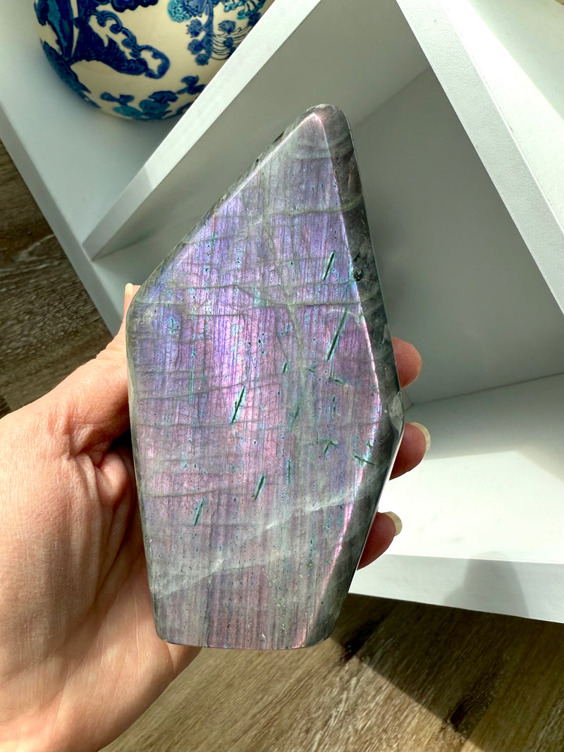 A purple flash sunset labradorite freeform tower statement piece for your crystal collection