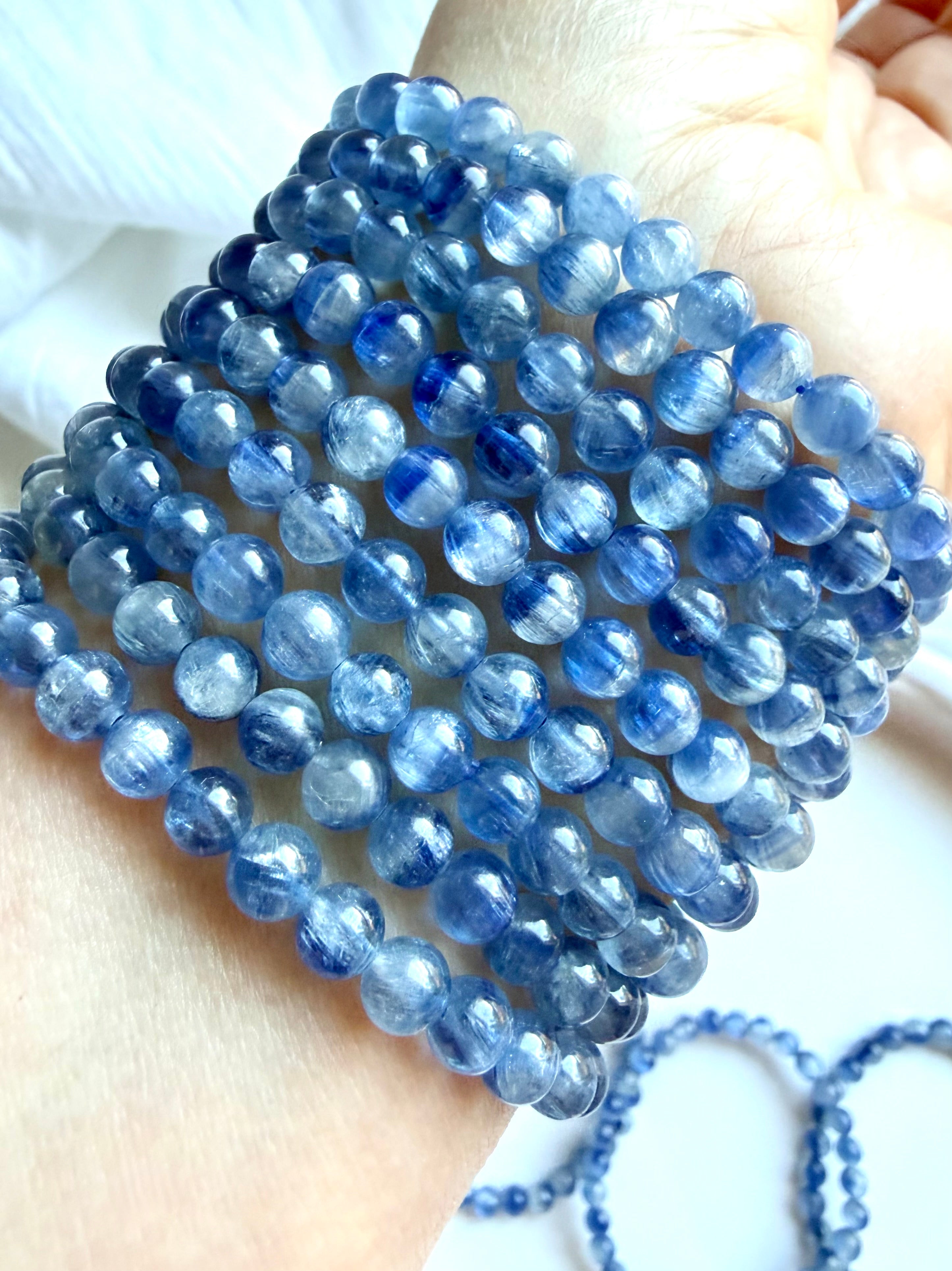 Blue Kyanite bracelet with translucent blue gemstones in icy blue, cornflower, and sapphire tones