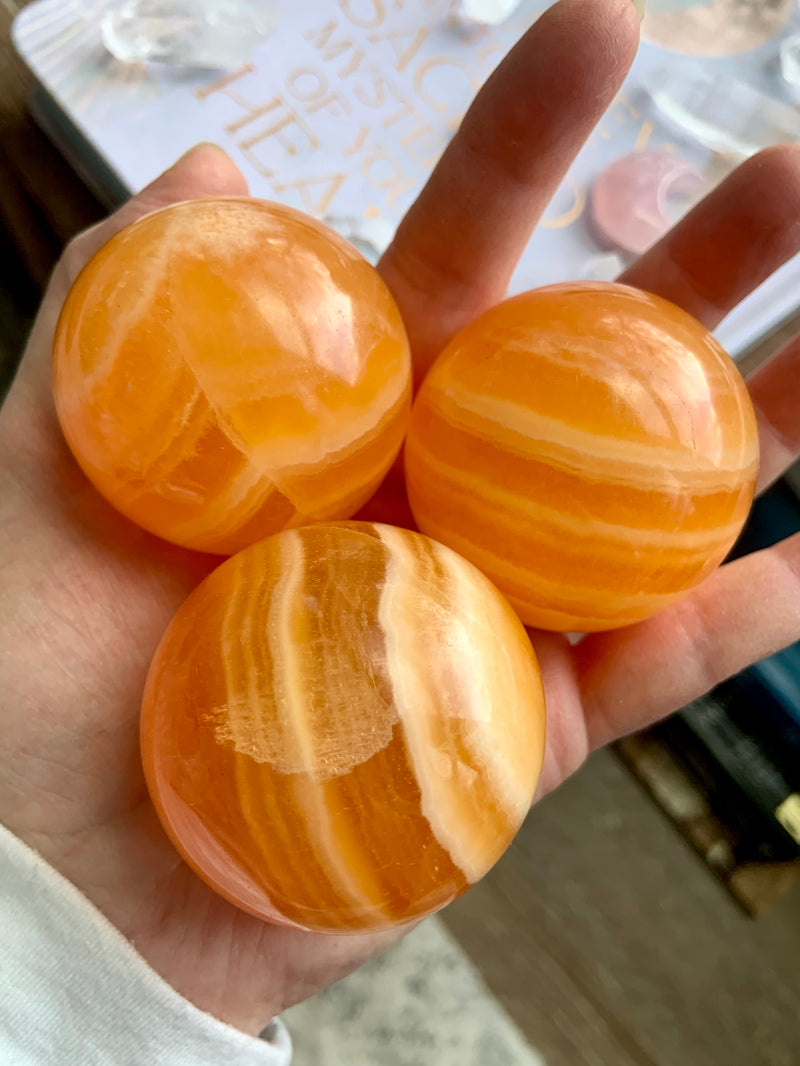 Sparkly Orange Calcite Spheres on Stand