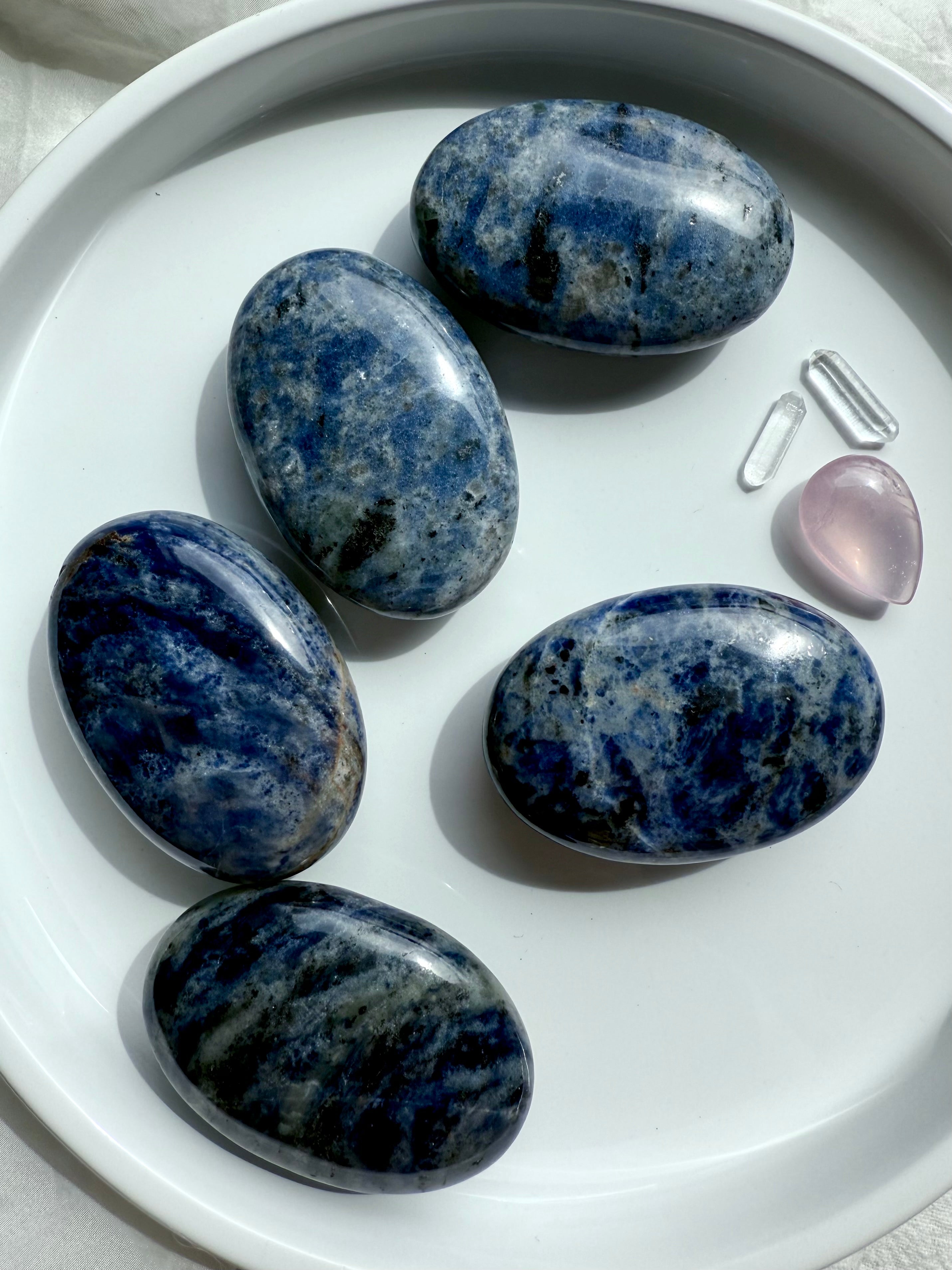 High quality blue Sodalite Palm Stones, a Throat Chakra crystal that helps you speak your truth