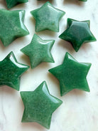 Polished Green Aventurine star carvings in light sage to deep forest green, crystals for manifestation and personal growth
