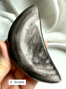 Detailed view of Silver Sheen Obsidian moon crystal surface, reflective obsidian for insight and shadow work