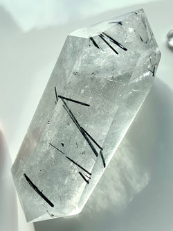 Double Terminated Black Tourmaline in Quartz Point shown on a white background. High Quality Tourmalated Quartz makes a great Crystal Collector Gift