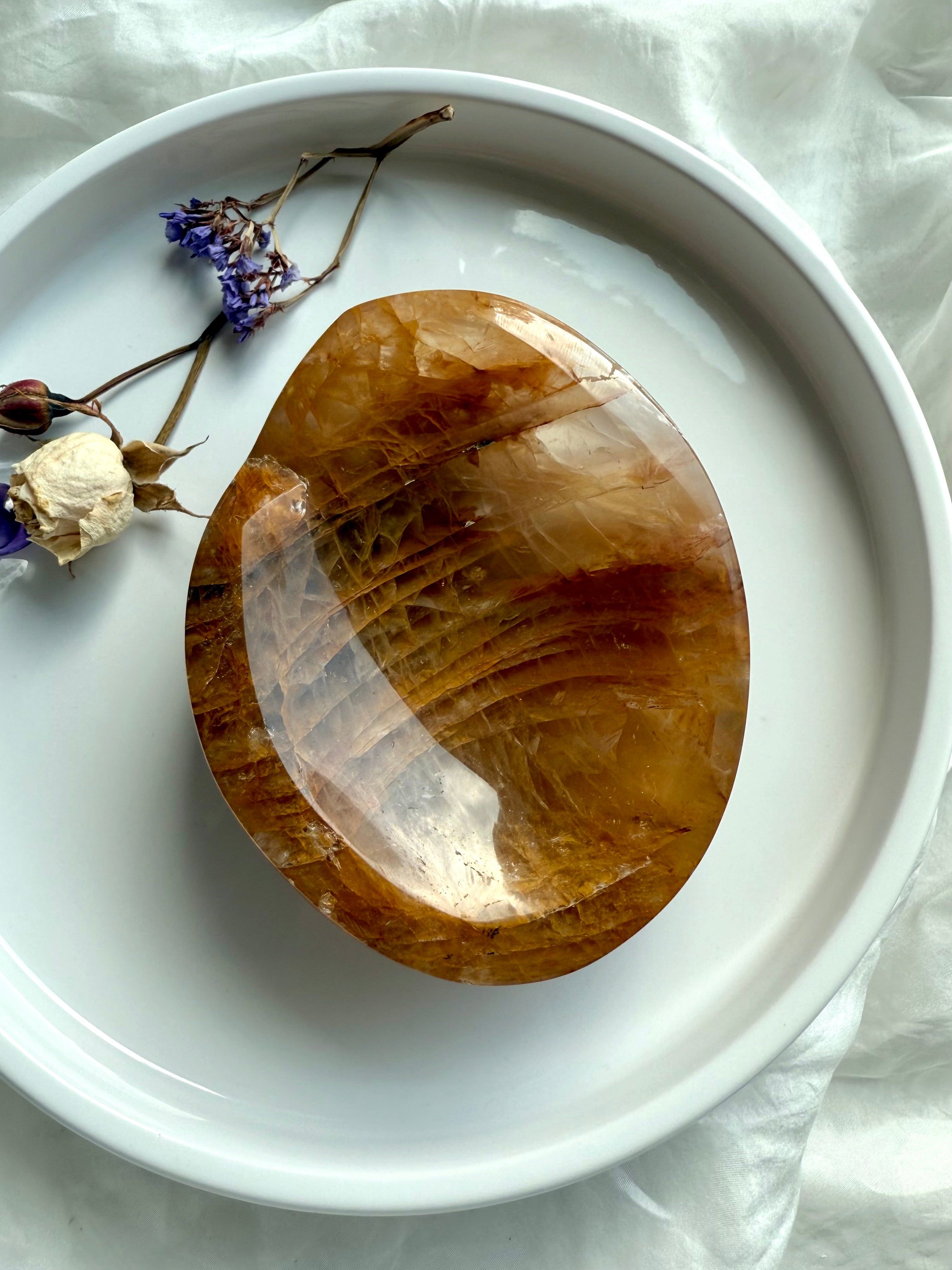 Top view of polished Golden Healer crystal bowl highlighting smooth inner surface and translucent quartz