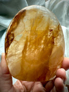 High-quality Golden Healer Quartz freeform stone with radiant golden healing energy and polished finish