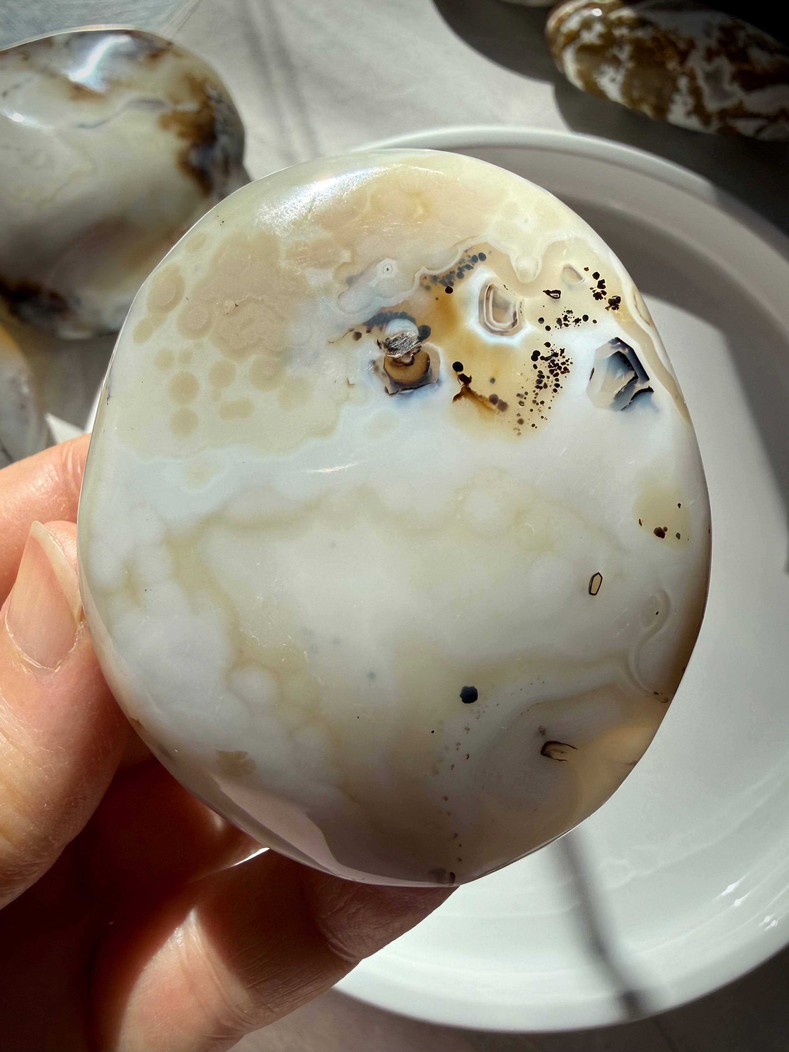 Natural Dendritic Agate freeform with soft honey-colored banding, delicate mineral inclusions and smooth rounded edges