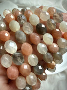 Natural Moonstone bracelet beads showing sparkling facets, silky shimmer, and beautiful variations in color and translucency