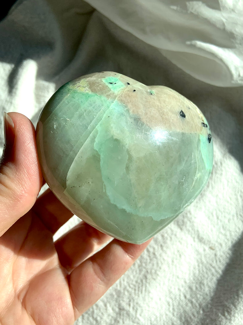 Green Moonstone is a Heart Chakra stone. A crystal heart is an emblem of love + make a sweet gift