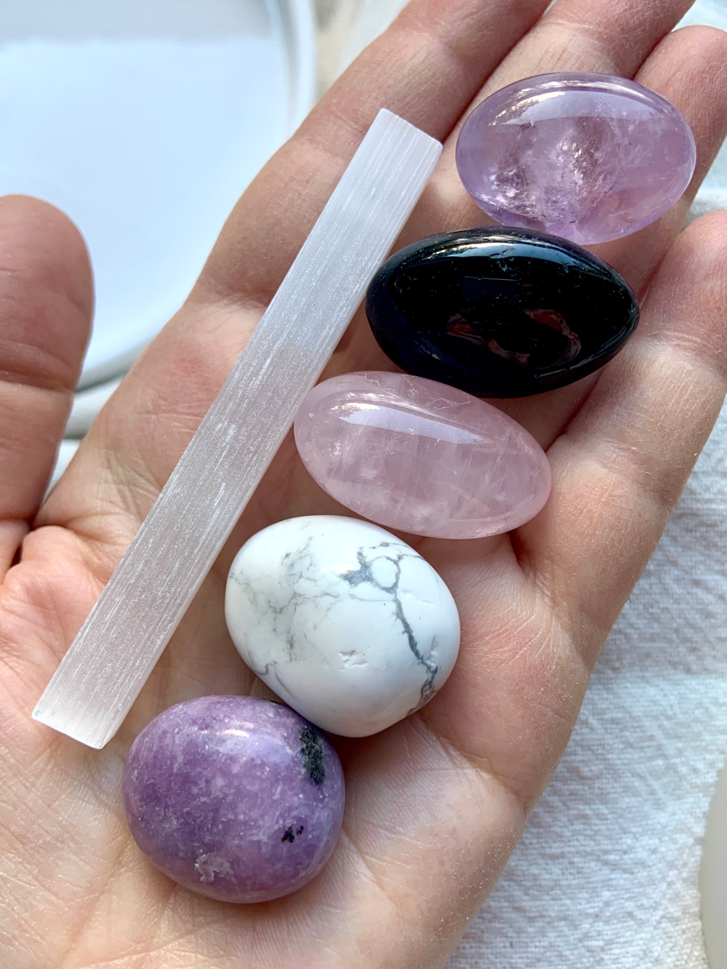 Sweet Sleep Crystal Set stones displayed in palm, includes 6 polished crystals for rest and dreams