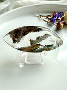 Scenic Garden Quartz crystal lens highlighting translucent quartz and mineral landscapes, comes with a stand