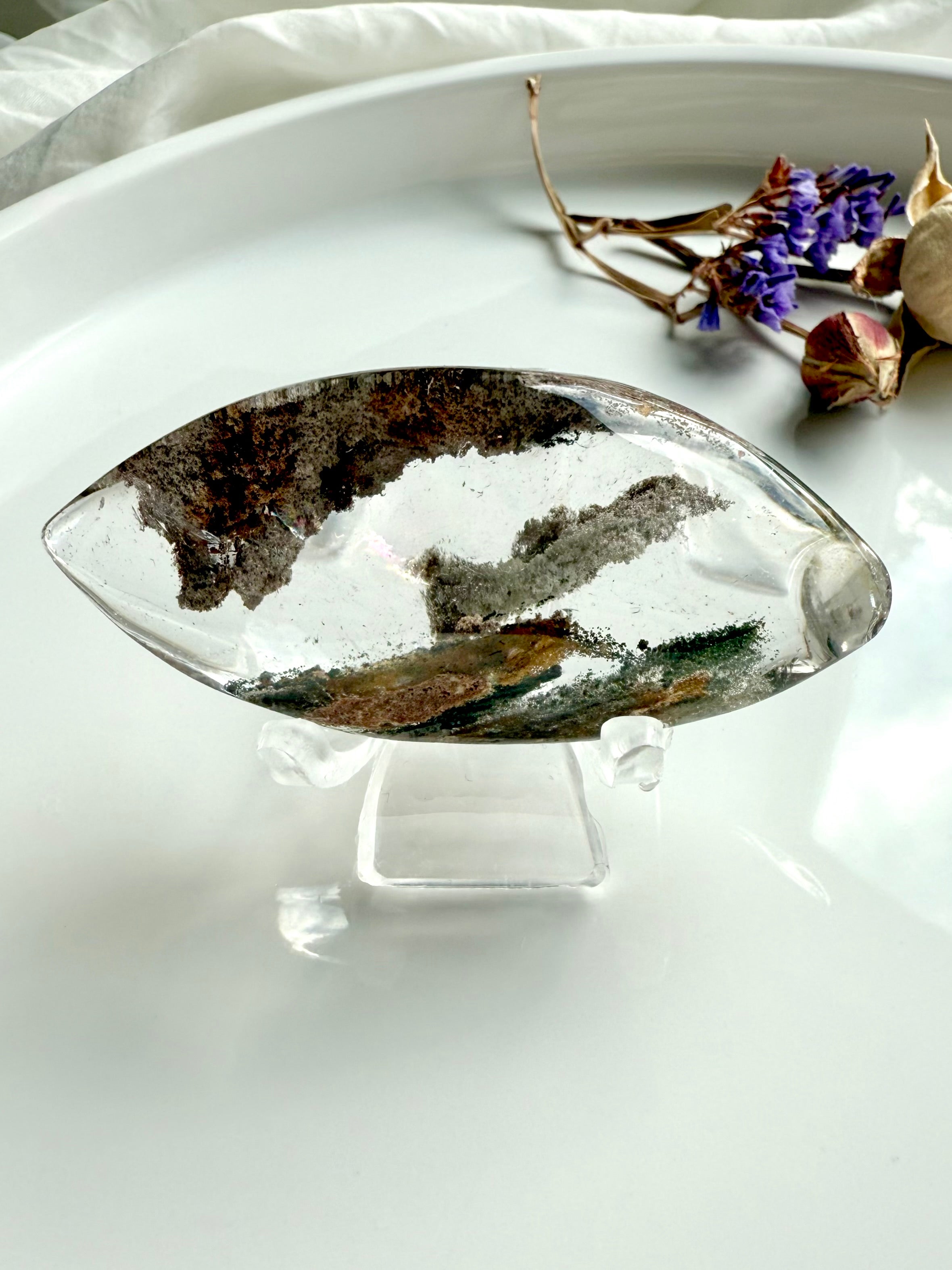 Scenic Garden Quartz crystal lens highlighting translucent quartz and mineral landscapes, comes with a stand