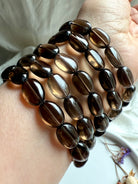 Smoky Quartz Bracelet with high-clarity oval beads – grounding crystal jewelry for protection, clarity, and energy clearing