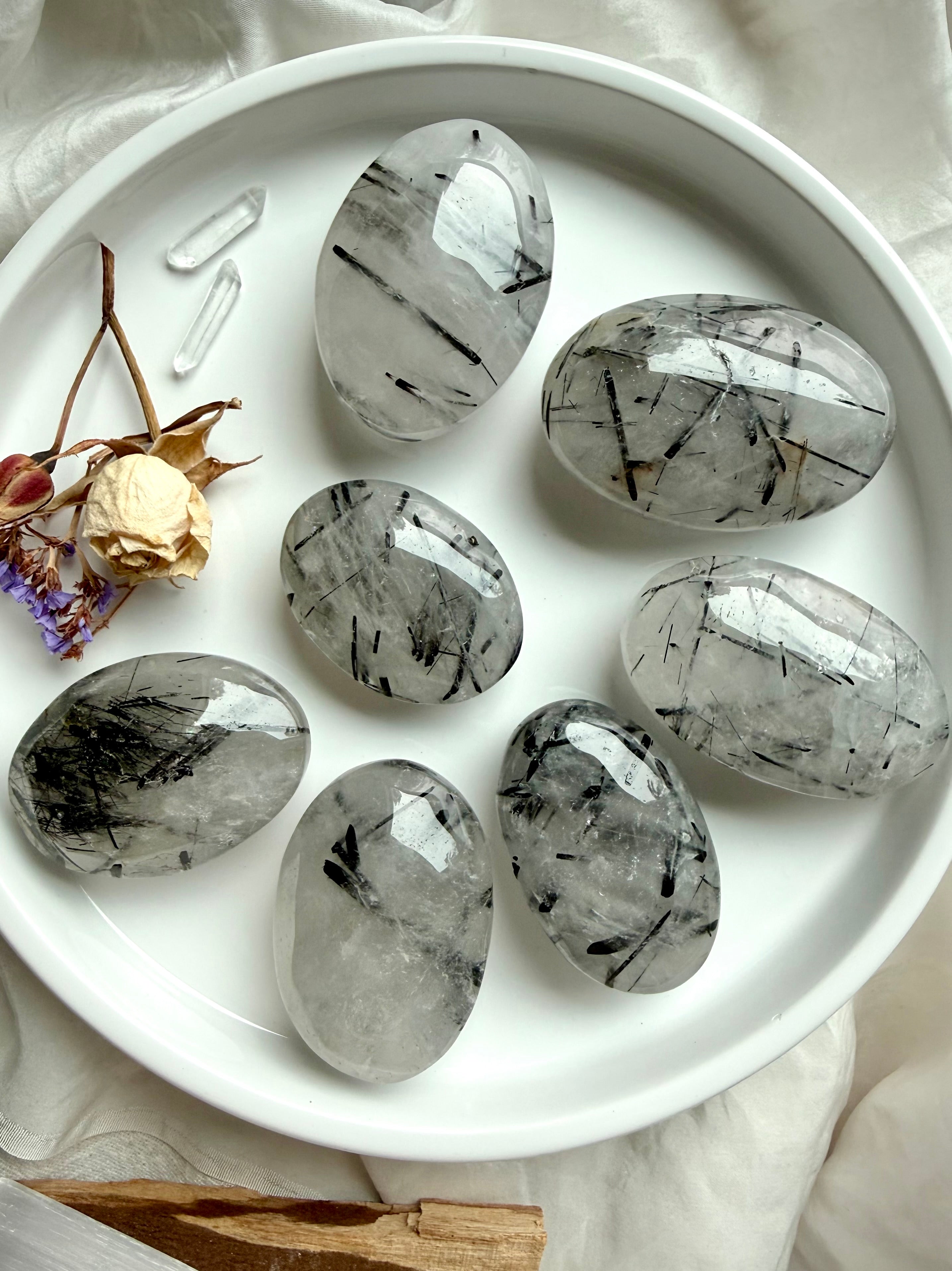 back view Black Tourmaline in Quartz palm stones showing natural tourmaline inclusions in clear quartz