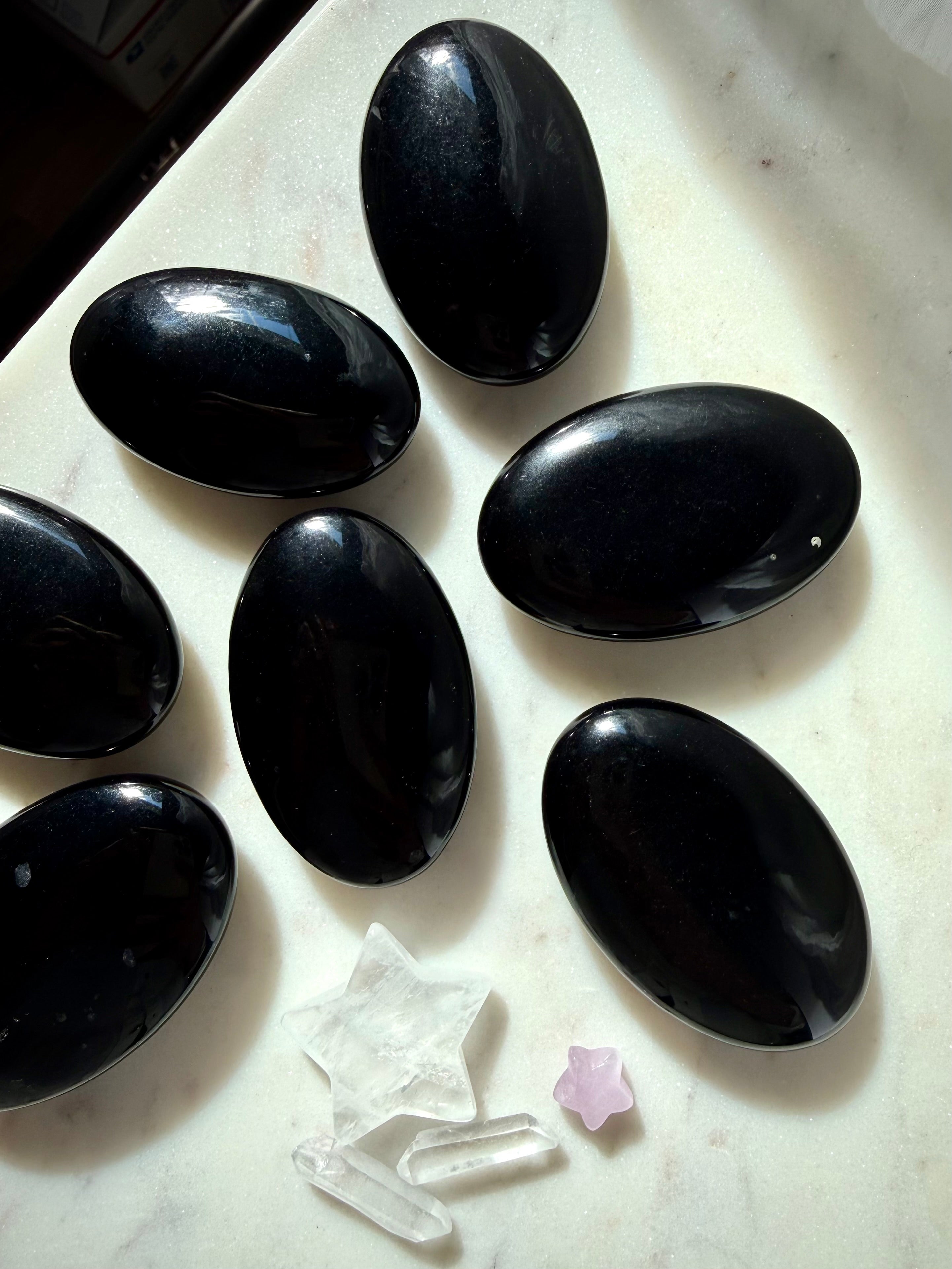 Intuitively chosen Black Obsidian palm stones with smooth oval shape for meditation, pocket stones, and energy work