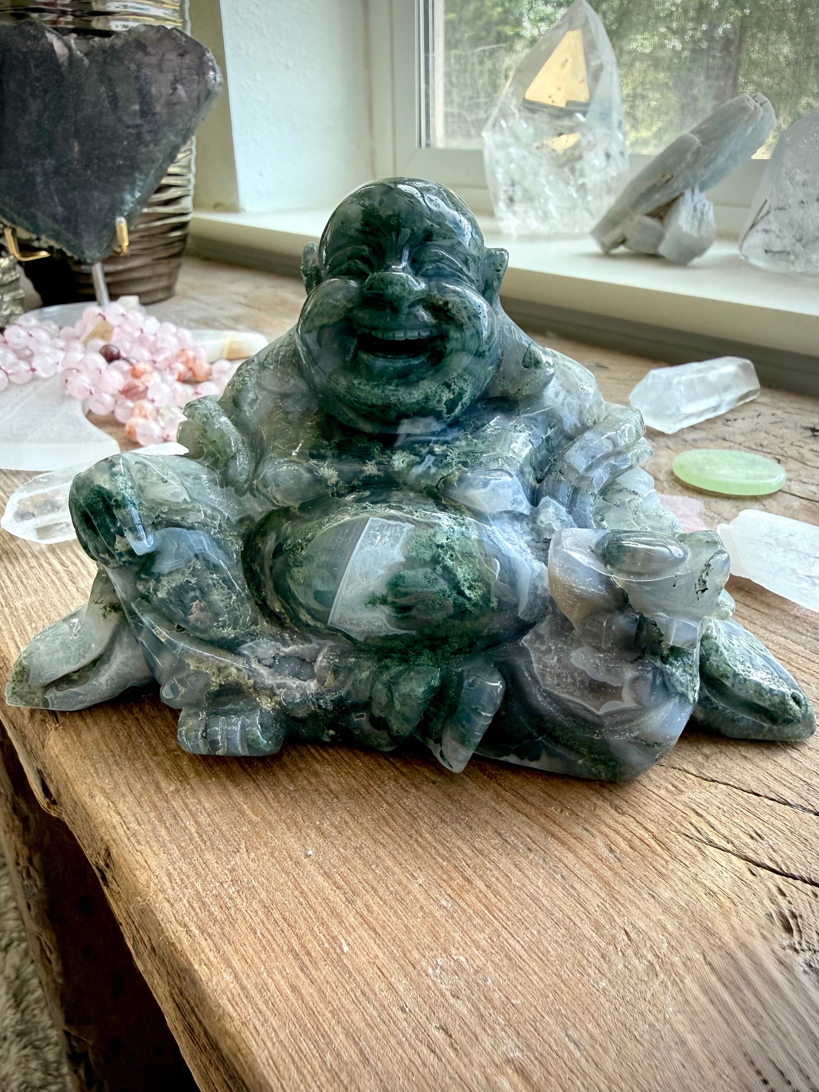 Large Moss Agate Laughing Buddha crystal statue with scenic inclusions for prosperity, abundance, and Feng Shui