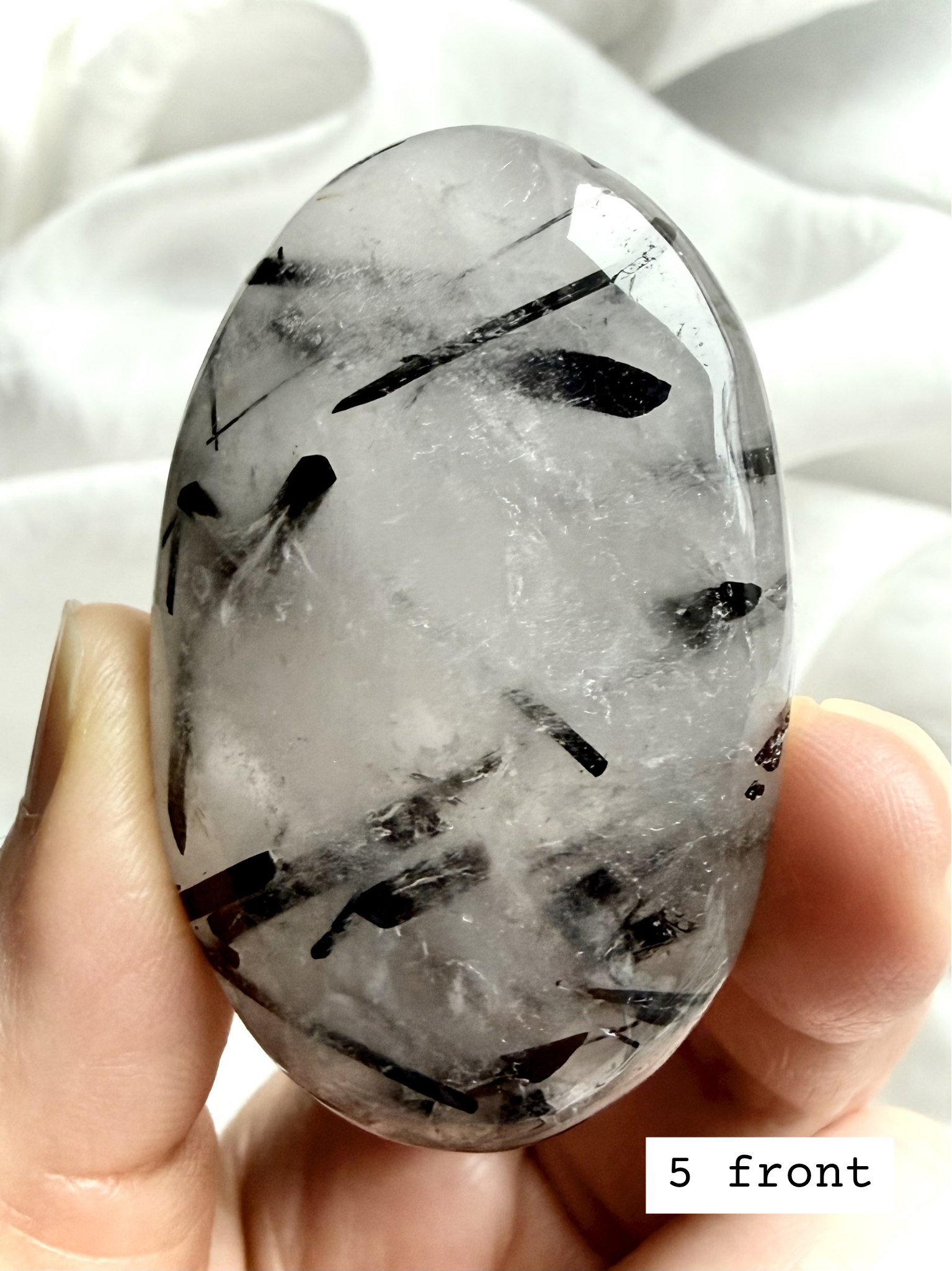 Black Tourmaline in Quartz palm stone 5 front view Tourmalinated Quartz for grounding and protection