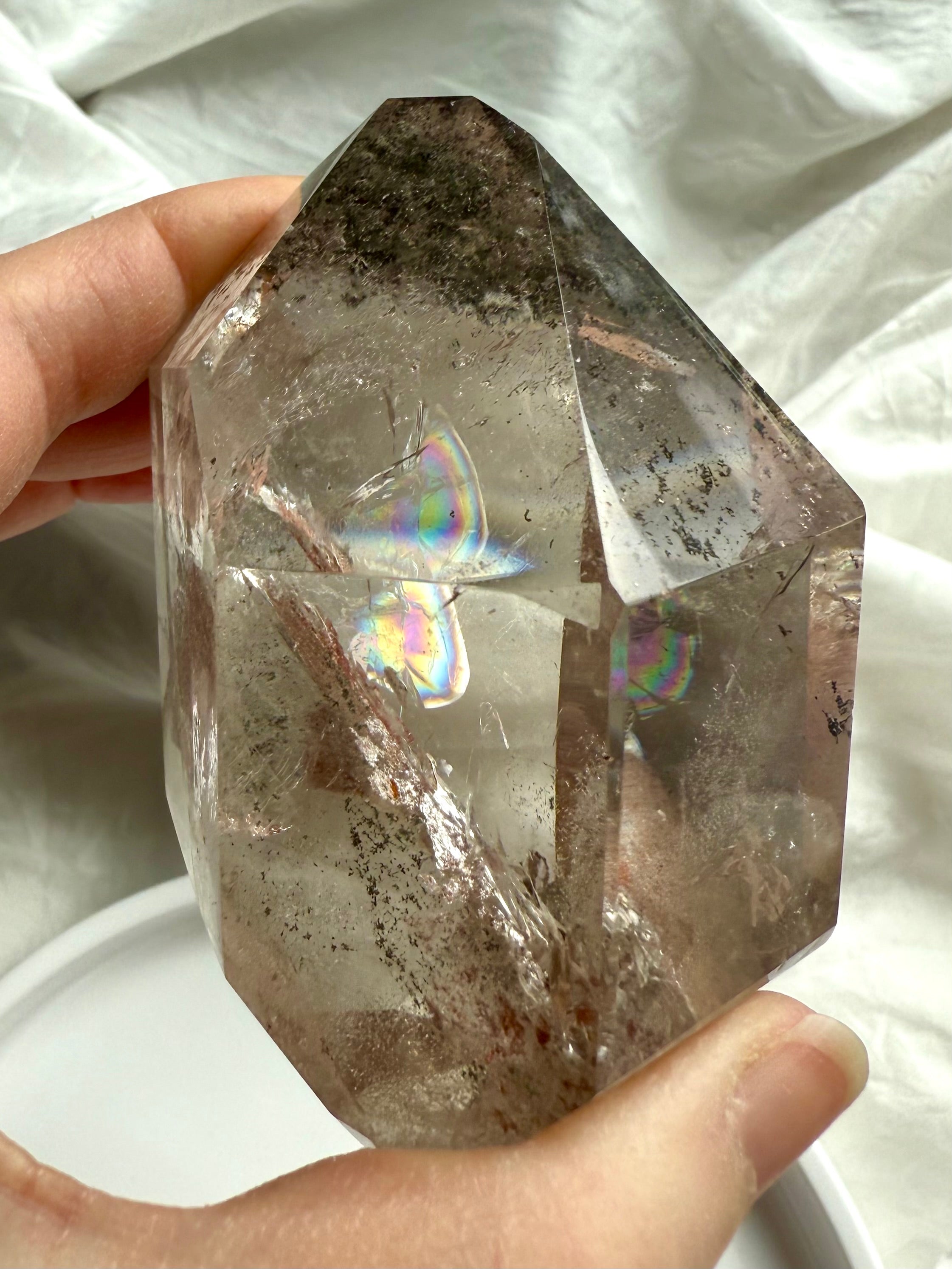 A Garden Quartz Phantom Crystal with green chlorite layers loaded with rainbows + mineral inclusions