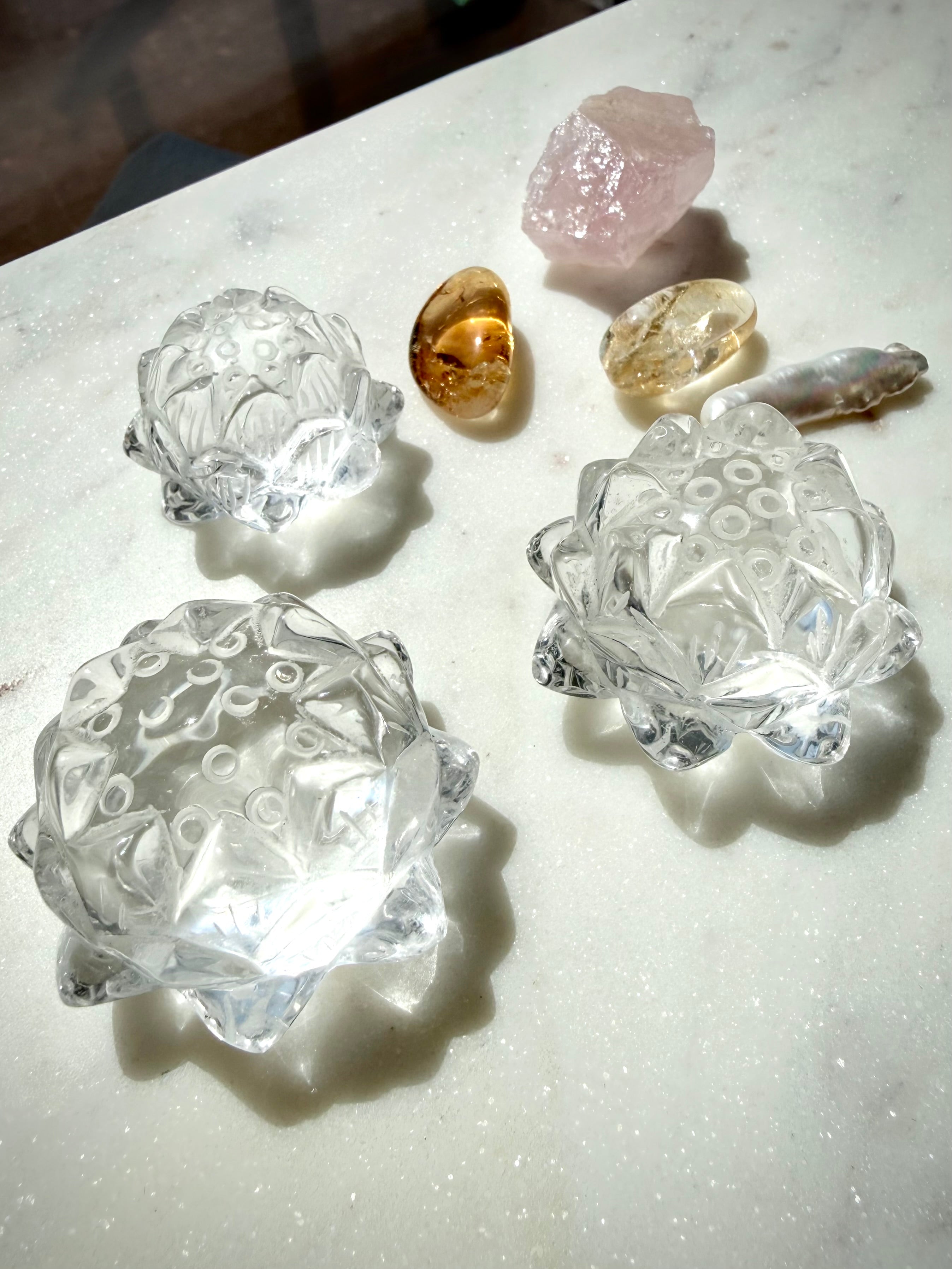 Clear Quartz lotus flower carvings with Citrine and other crystals for healing, clarity and new beginnings