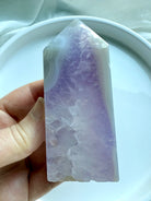 Amethyst and Agate Tower showing smooth polished faces and crystalline interior