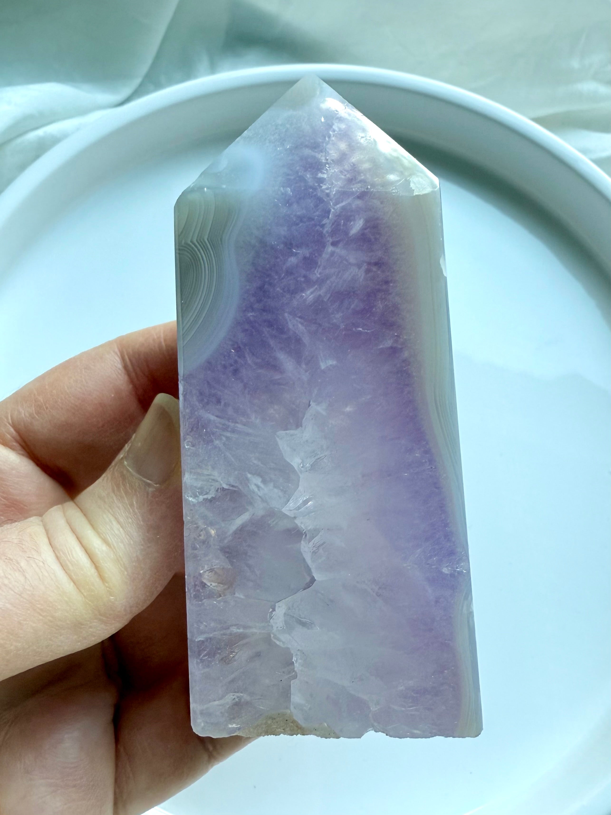 Amethyst and Agate Tower showing smooth polished faces and crystalline interior