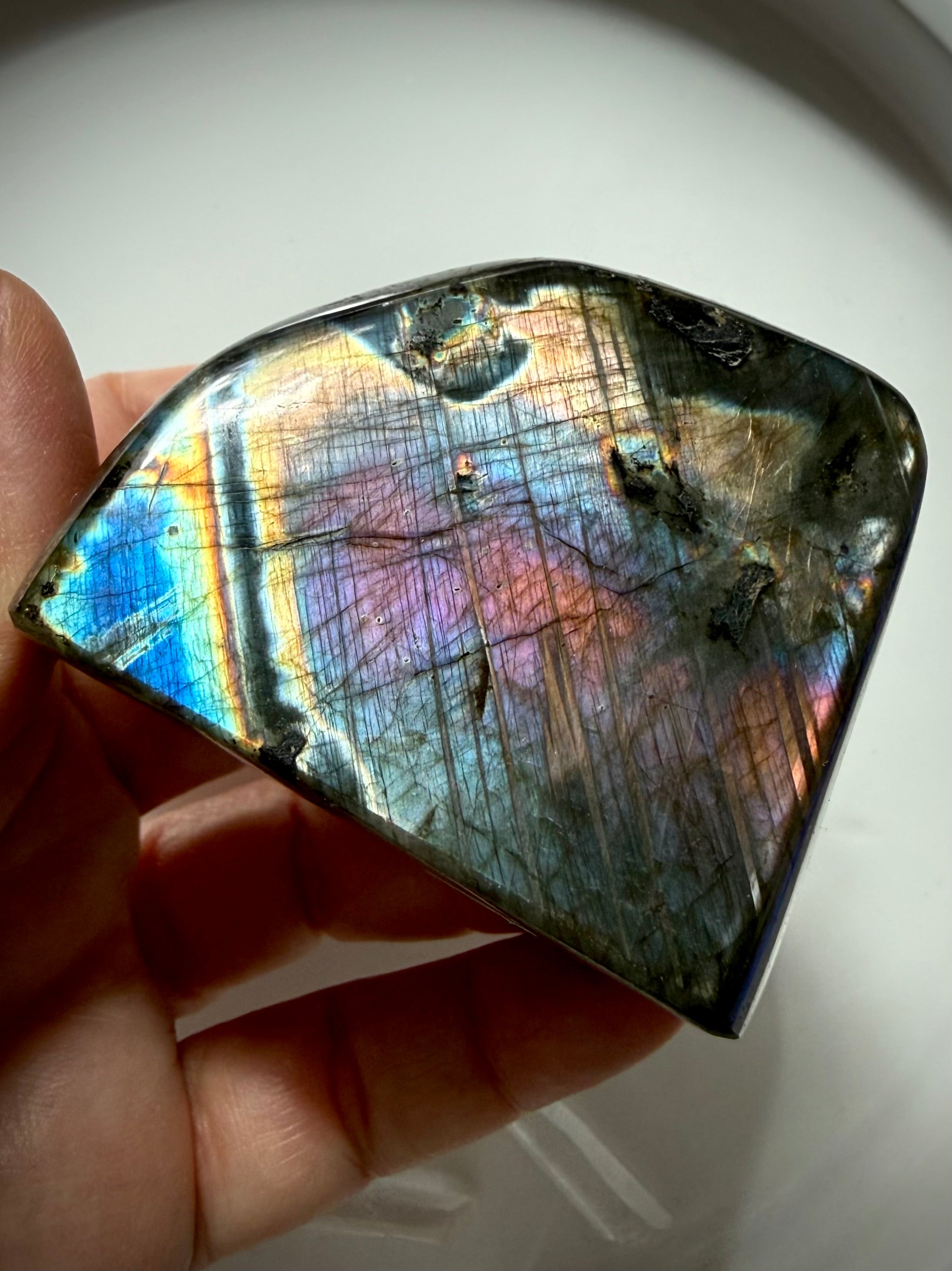 Polished rainbow Labradorite freeform with blue, pink, purple and gold flash