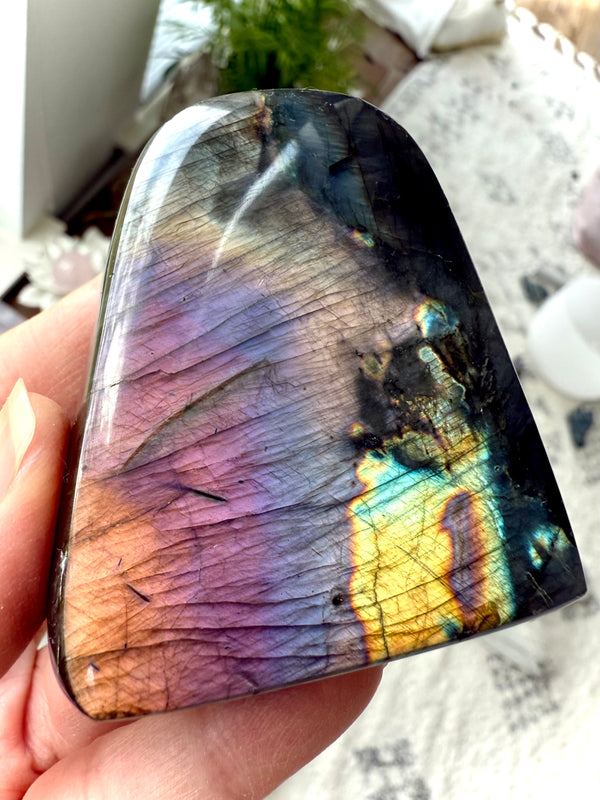 A Rainbow Sunset Labradorite Freeform Crystal with gorgeous gold, orange, pink, purple, blue colors