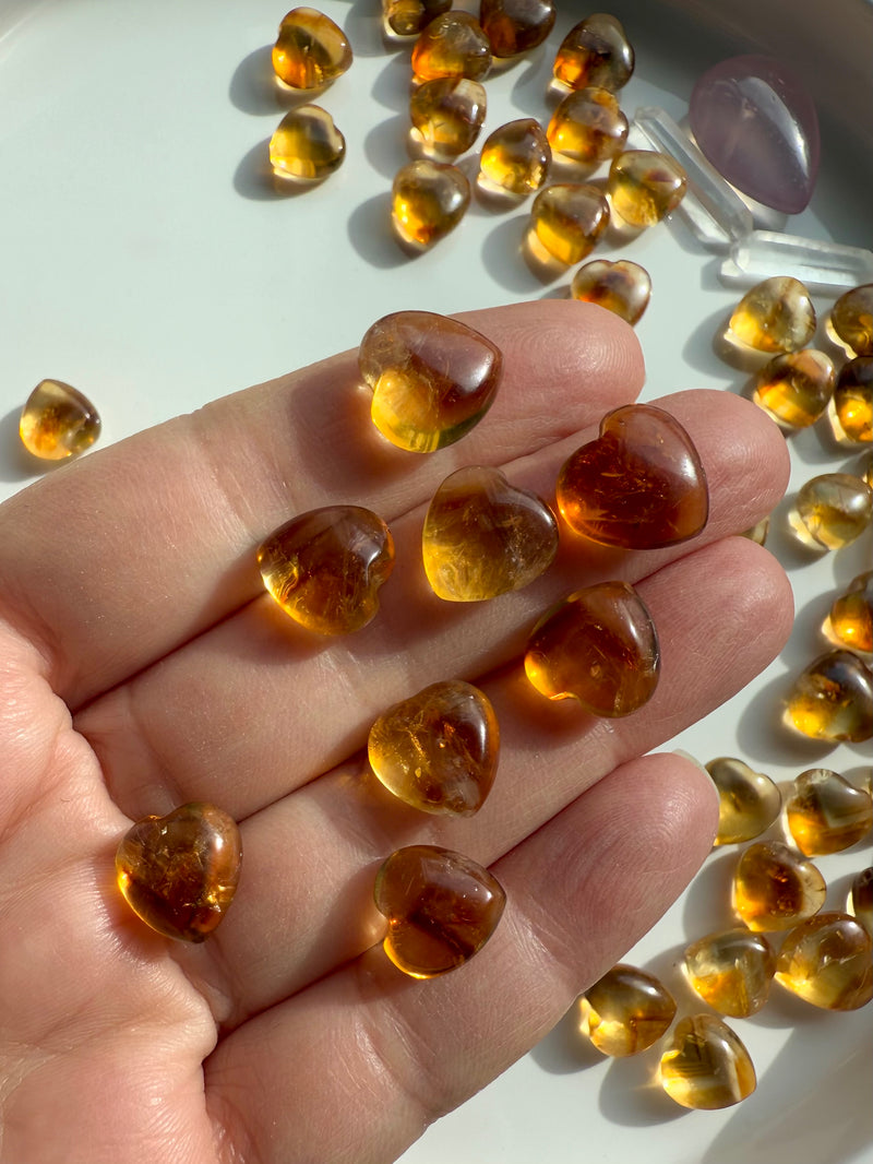 Mini Citrine Hearts shown on my hand for scale