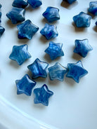 Blue Kyanite star carvings with silky blue shimmer and natural mineral patterning
