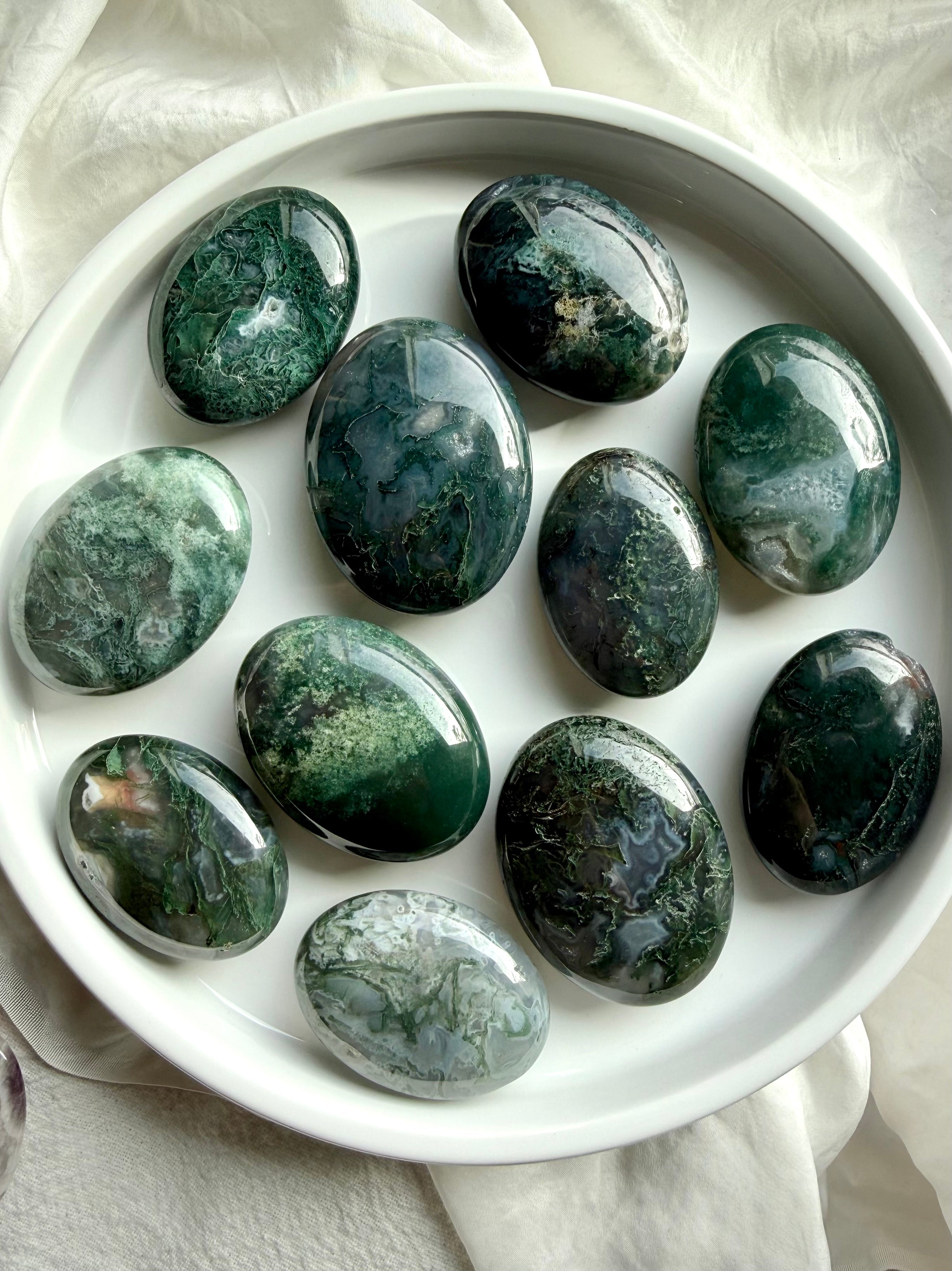 Moss agate palm stones with green dendritic inclusions, polished grounding crystals for calm, emotional balance, and meditation