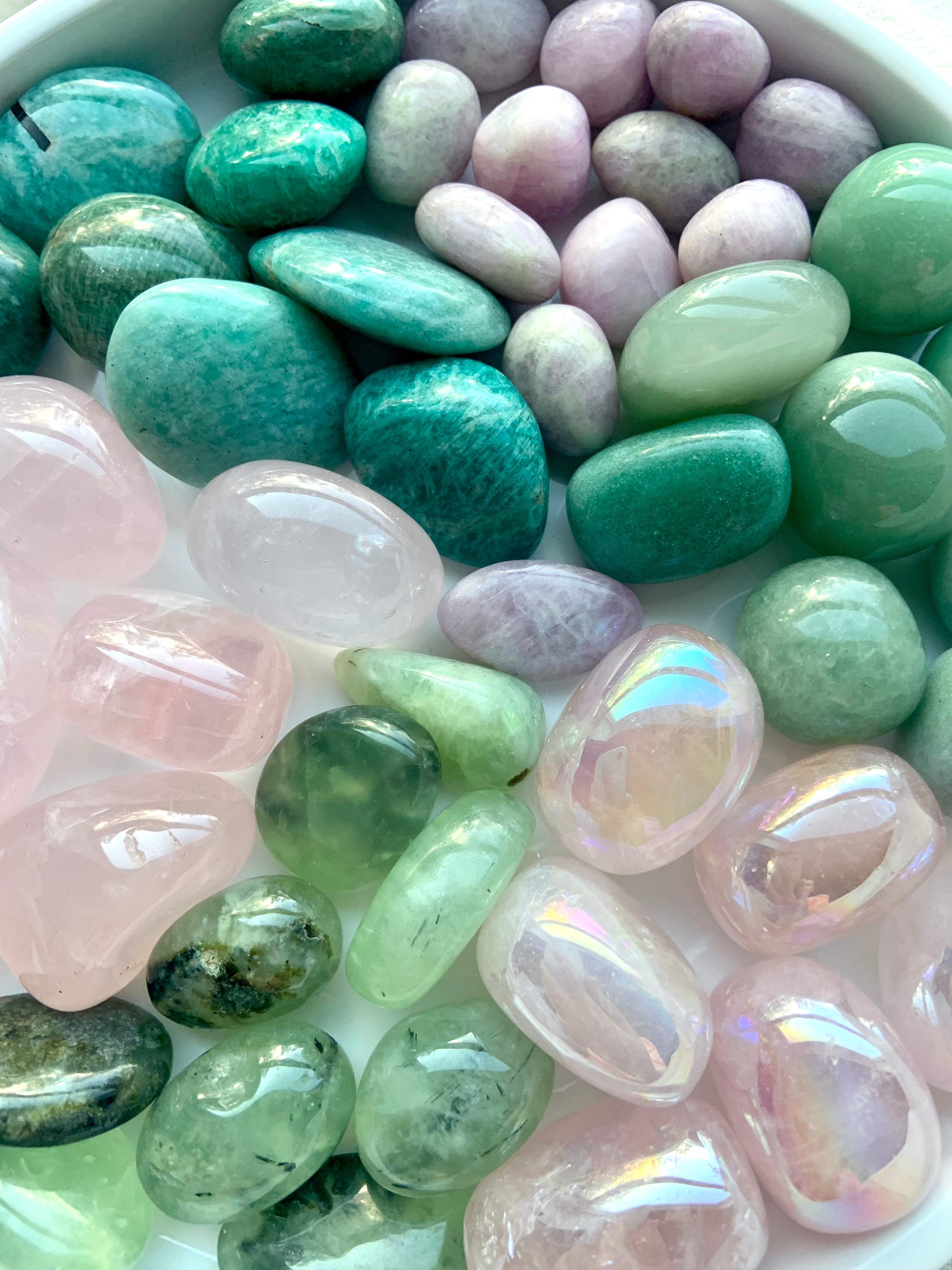 Close-up of Heart Chakra tumble stones — a vibrant healing crystal set featuring high-quality pink and green crystals for love and emotional healing.