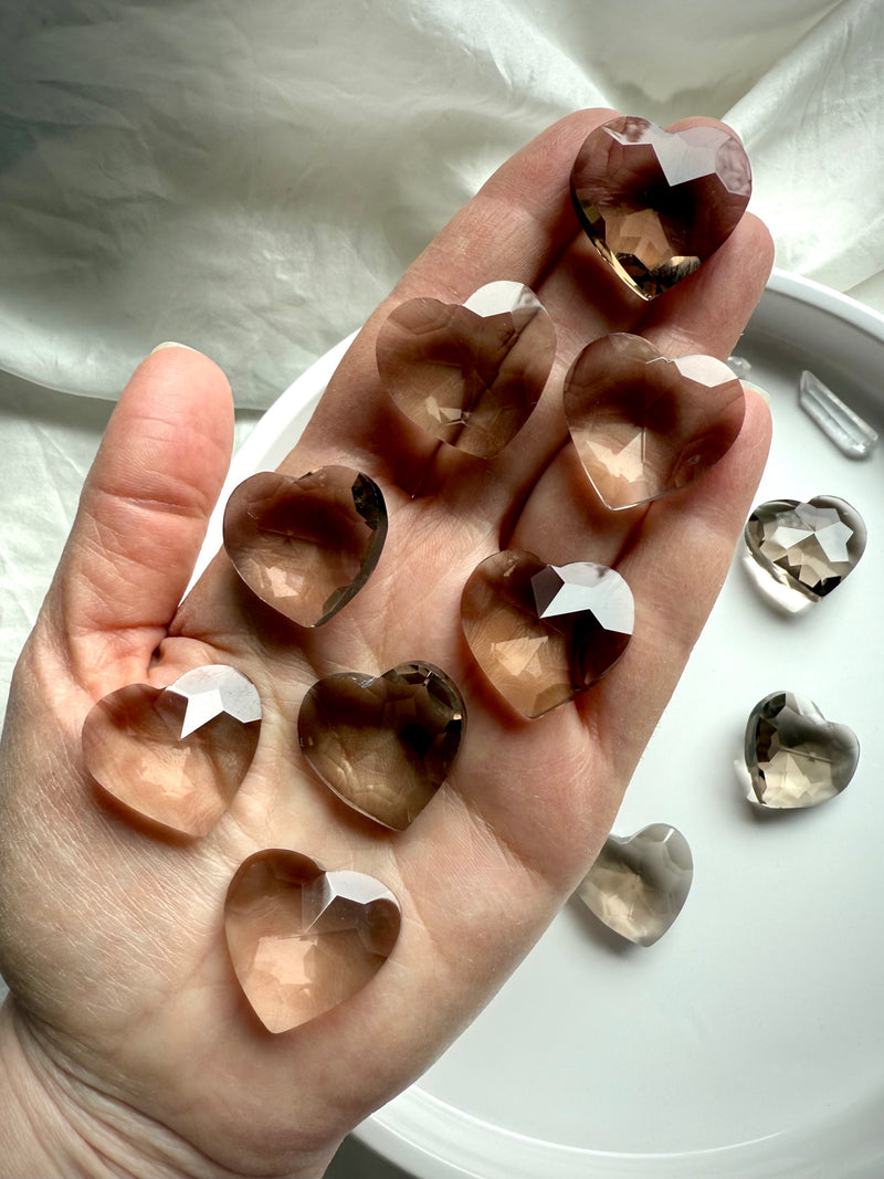 Sparkly Smokey Quartz Crystal Hearts shown on my hand for scale