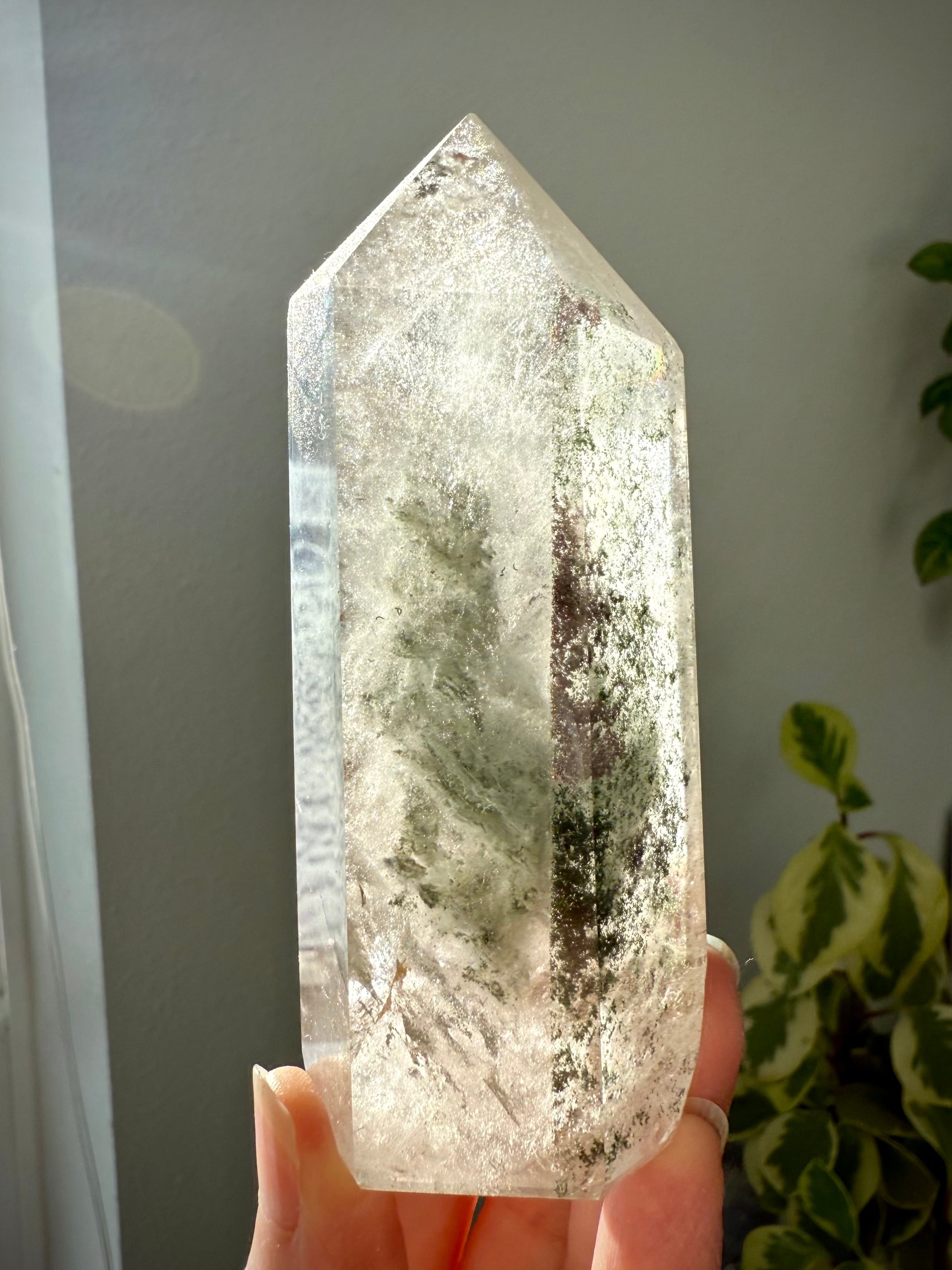 A Thousand Layer Garden Quartz Crystal Tower with a 5-sided Isis Face, rainbows + chlorite phantoms