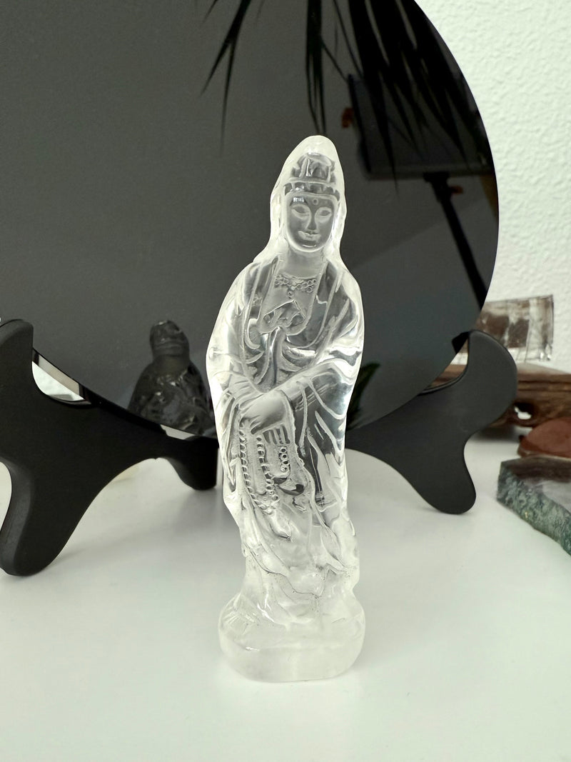 A crystal Quan Yin carving to elevate your sacred space made from Clear Quartz Crystal