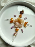 Mini crystal moon carvings with Golden Healer Quartz stars, Flower Agate flower, Kunzite, and Clear Quartz