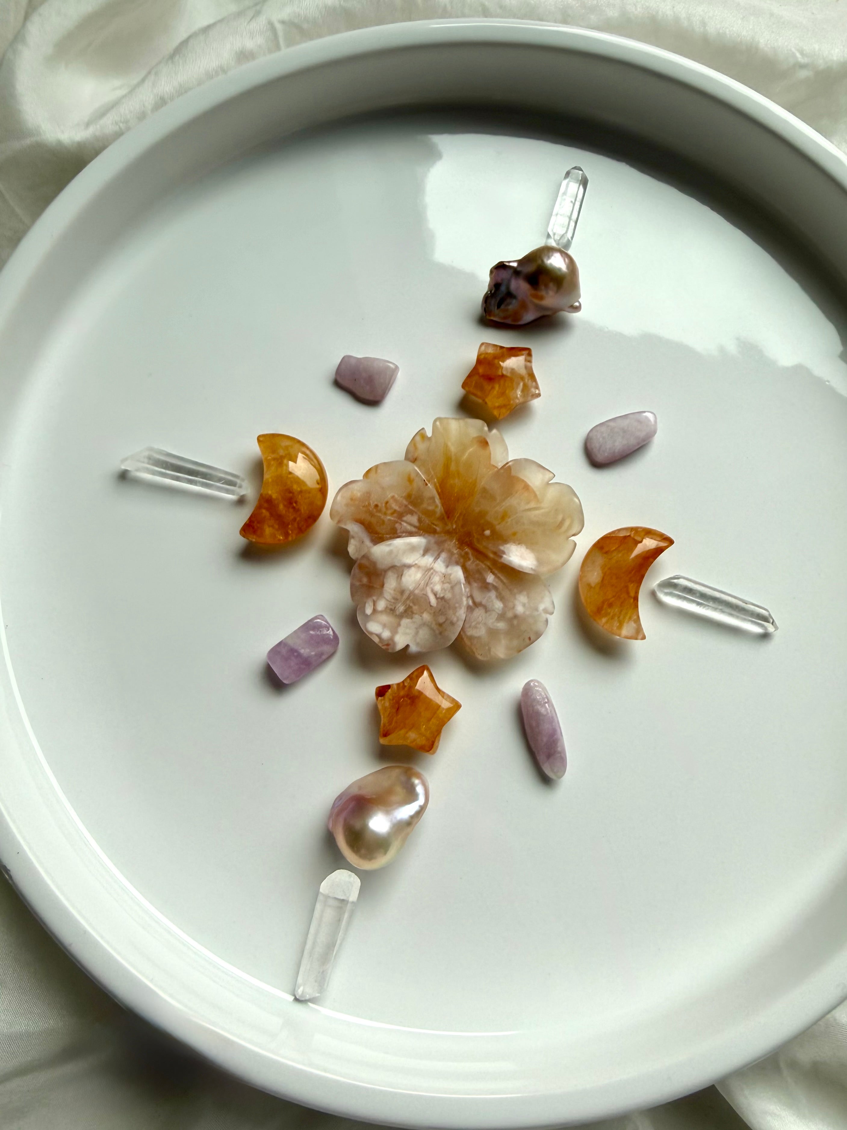 Mini crystal moon carvings with Golden Healer Quartz stars, Flower Agate flower, Kunzite, and Clear Quartz