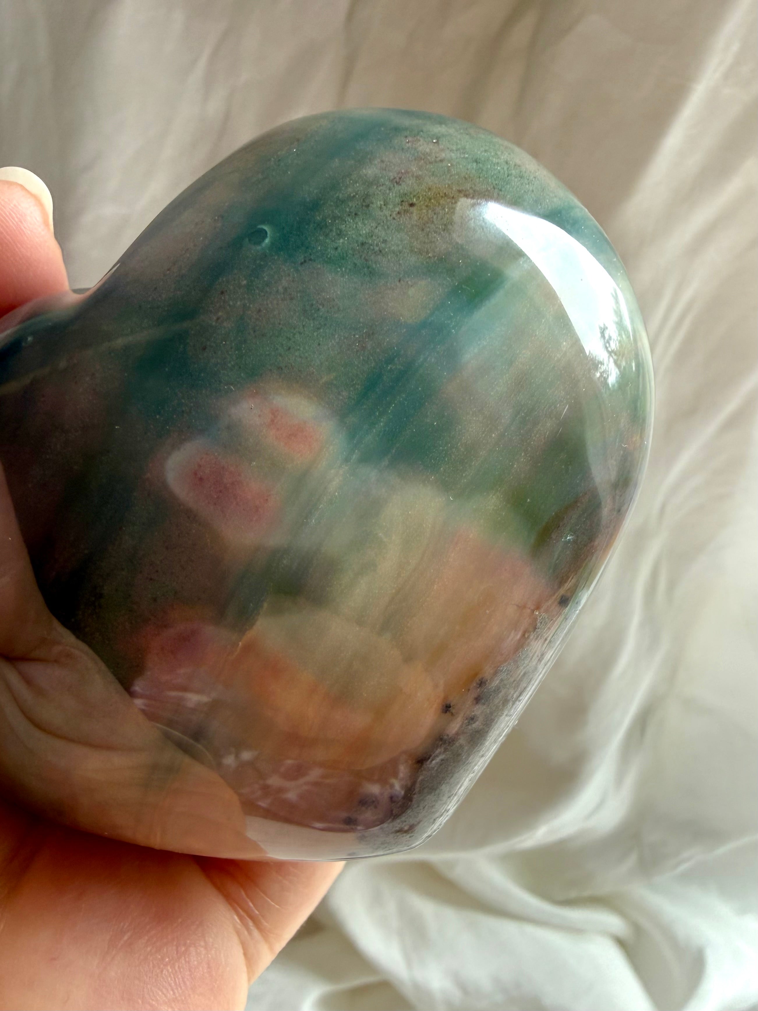 Collector quality Ocean Jasper heart carving with earthy pastel tones and flowing wave formations