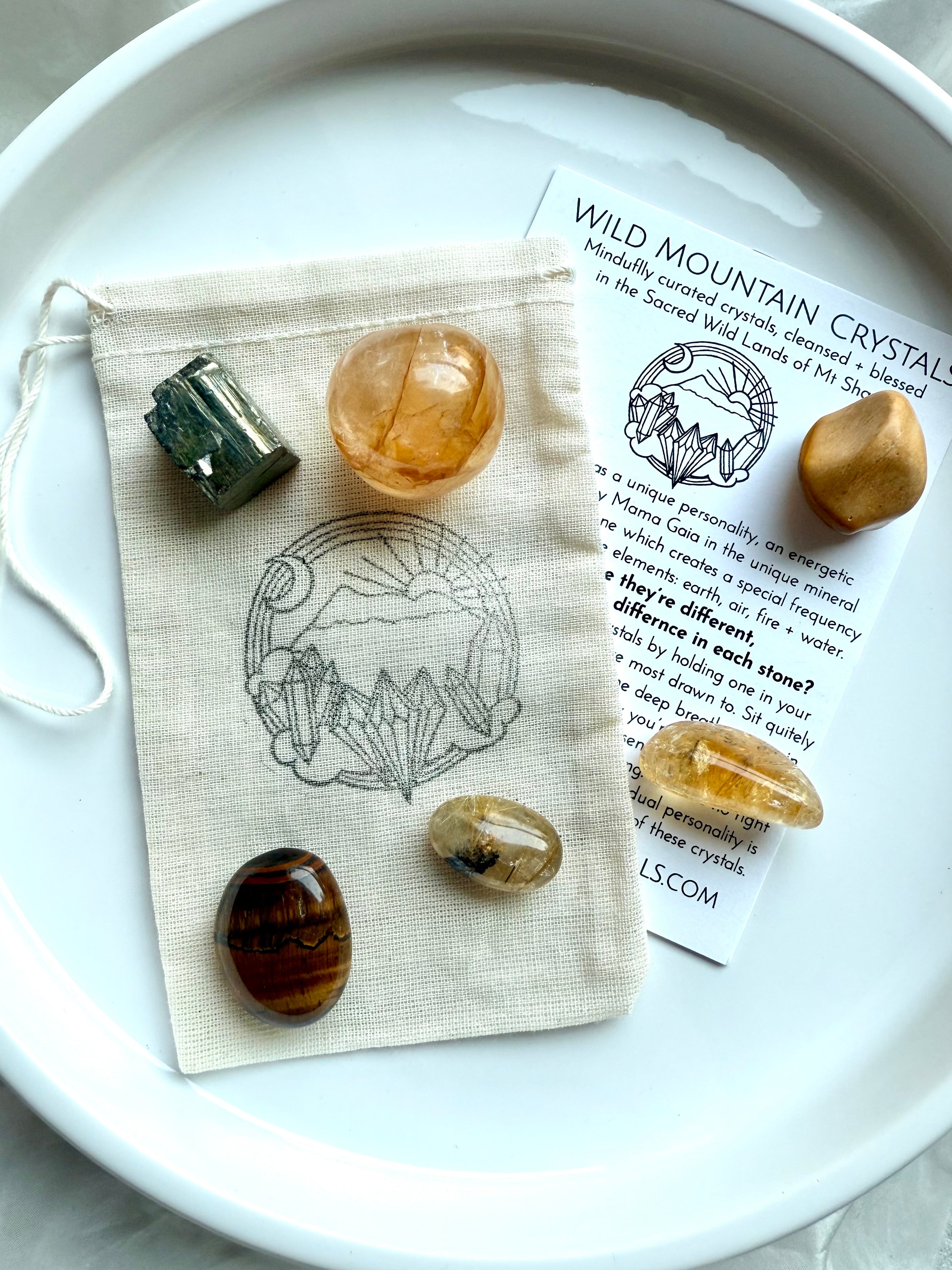 Solar Plexus Chakra set with golden healer, citrine, golden rutile, tiger’s eye, yellow mookaite, and raw pyrite on cotton pouch with info card