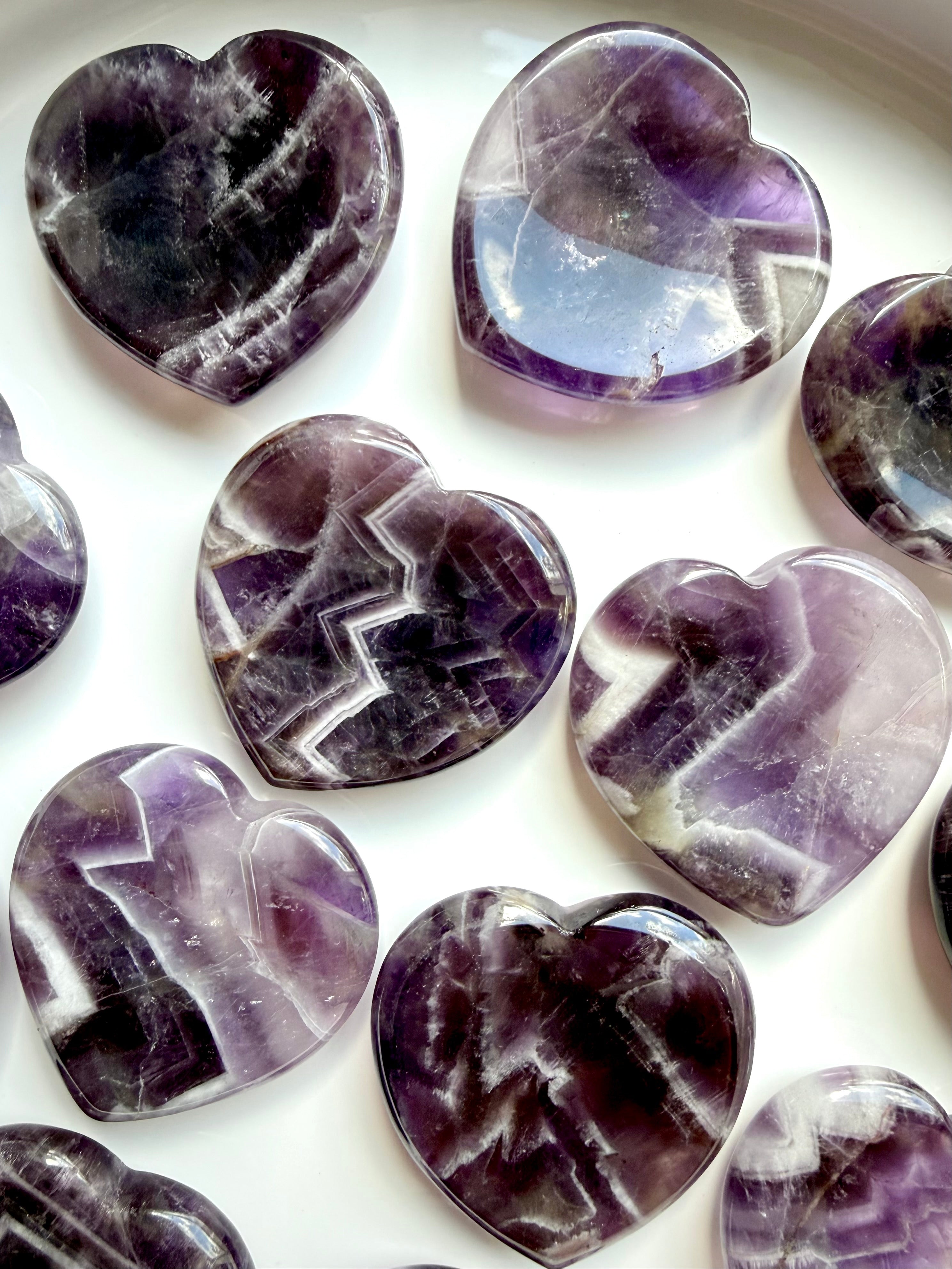 dream amethyst heart crystals arranged together for intuition clarity and emotional balance